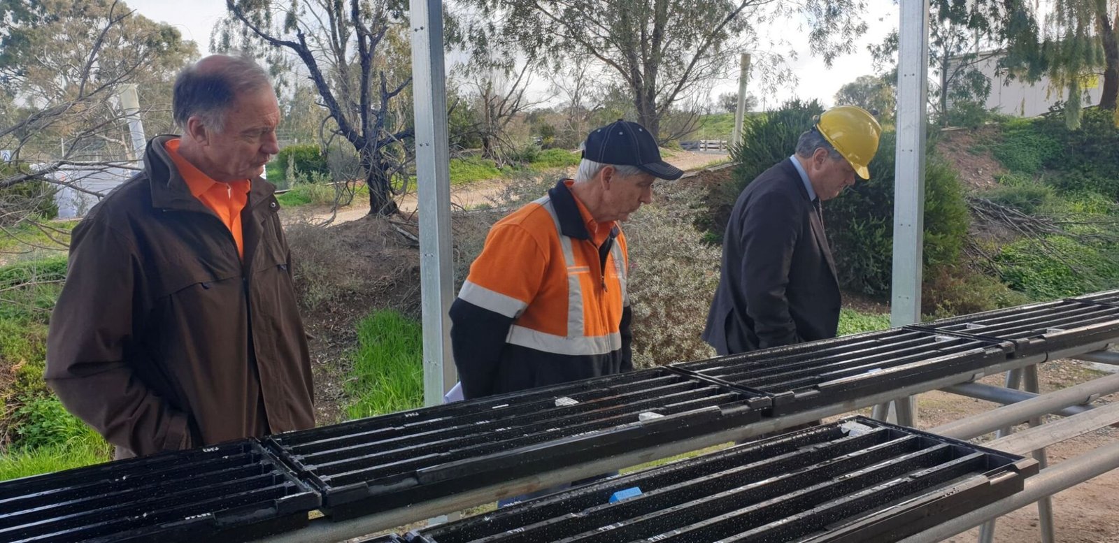 ) Chair Derek Carter (left), chief geologist Peter Rolley (centre) and Department of Energy & Mining chief executive Paul Heithersay (right).