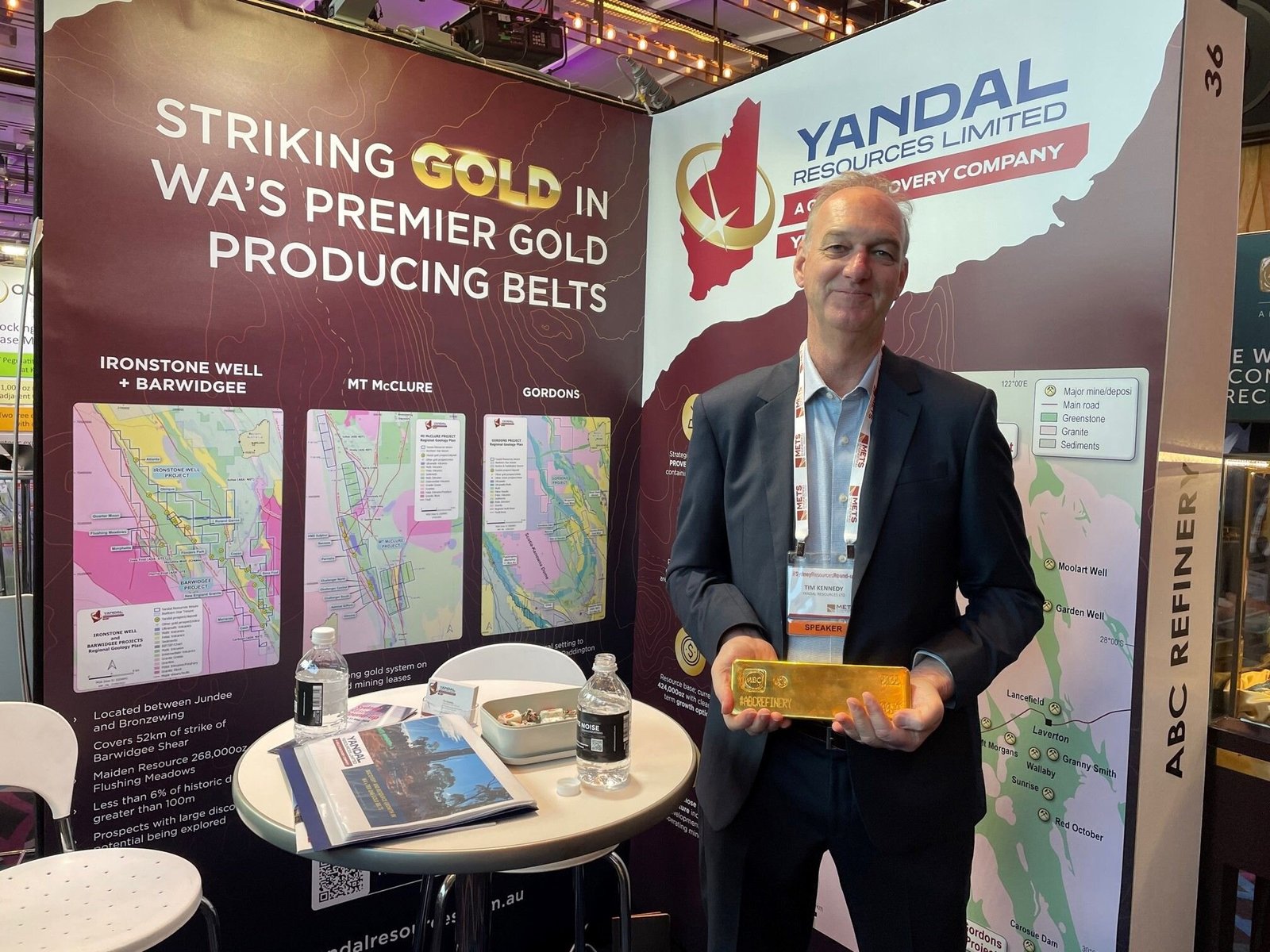 Managing director and Tim Kennedy holding a 400oz gold bar worth $1.2m.