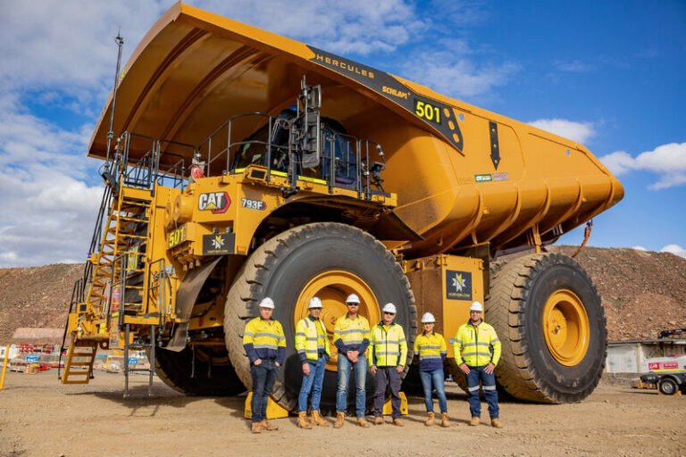 Northern Star Resources staff with CAT 793F haul truck at the KCGM operation.