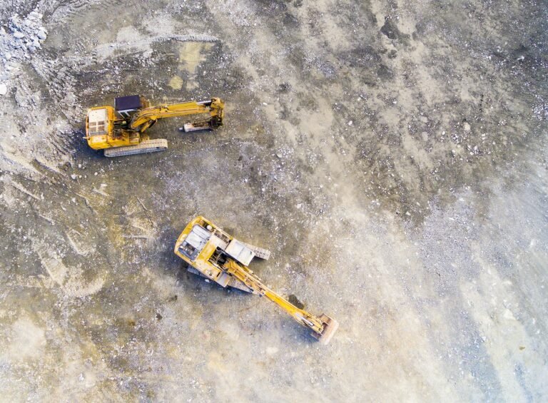 Aerial view of an excavator at a mine.