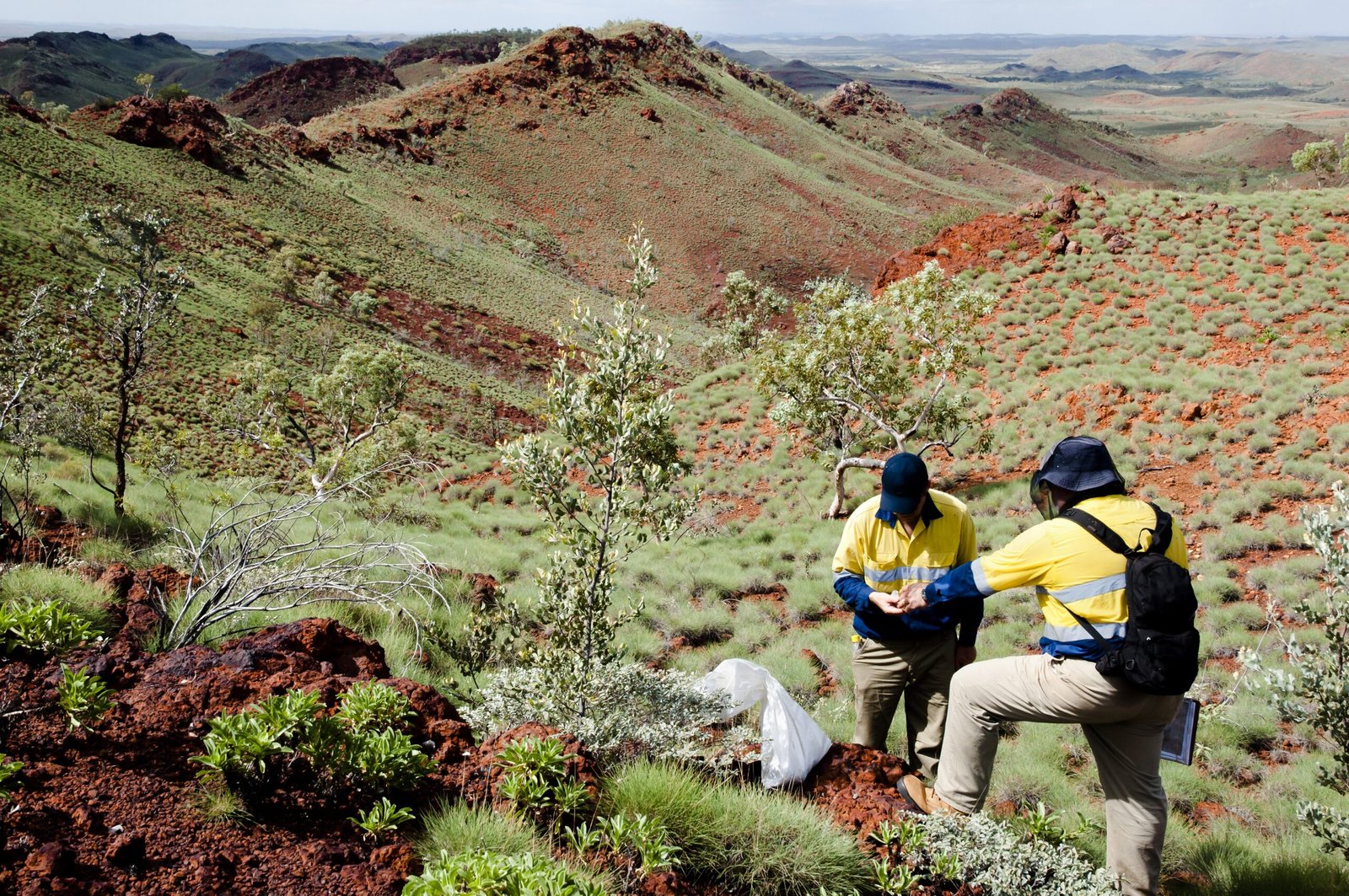 Geologists sampling rocks.