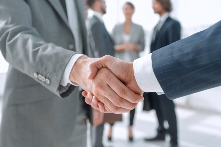 Handshake signalling close of a deal.