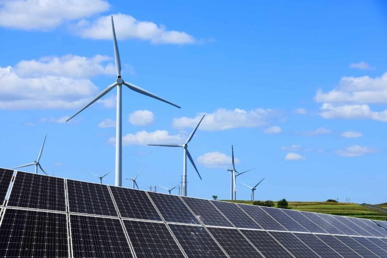 Wind turbines and solar panels.