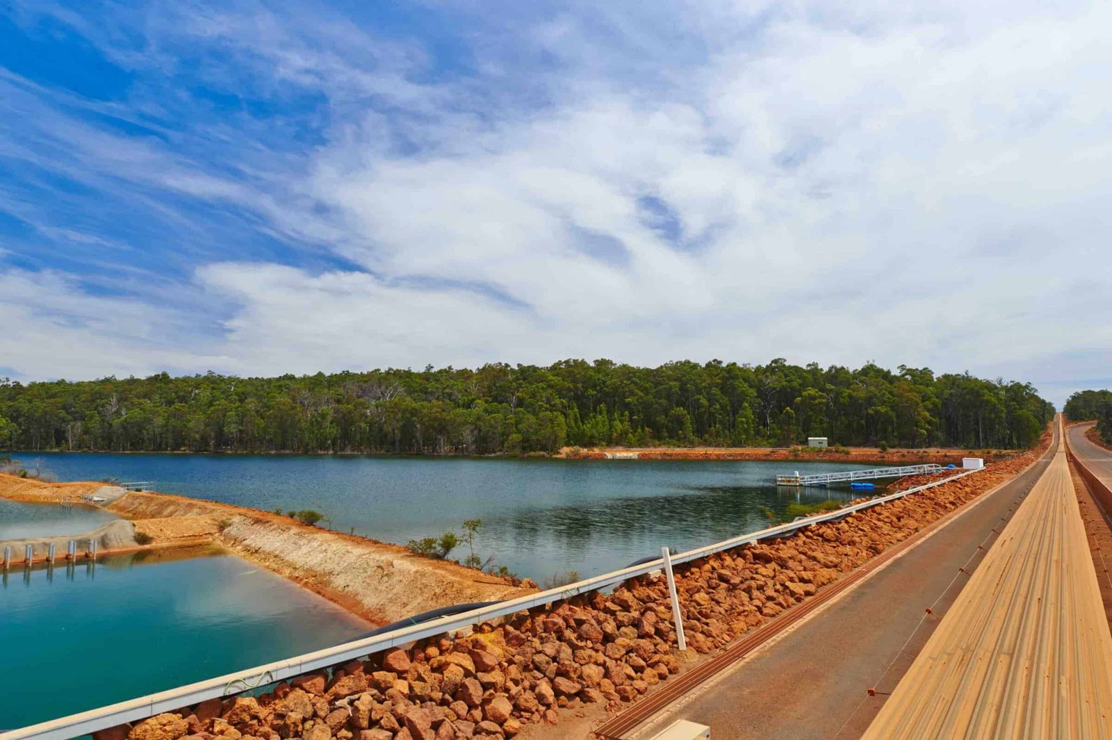 (Image source: Alcoa.) Bauxite mining in WA's southwest. The Alcoa Willowdale mine's Sampson Dam reservoir and causeway.