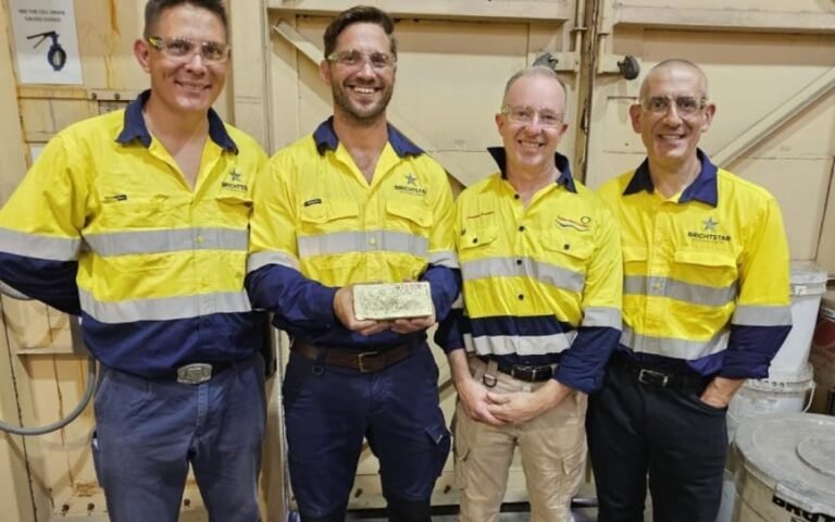 (Image source: Brightstar Resources) Brightstar board and management with BTR001 gold doré bar.