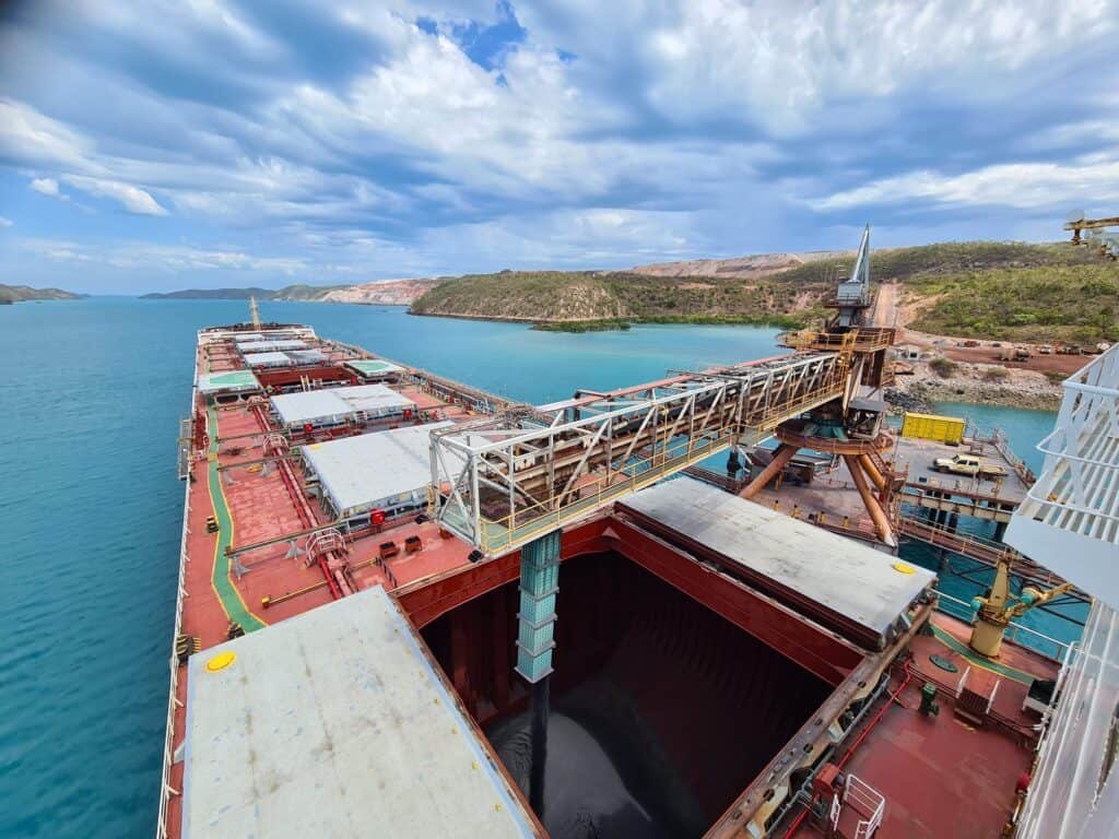 (Image source: Mount Gibson Iron) Shiploading iron ore at Koolan Island, WA.