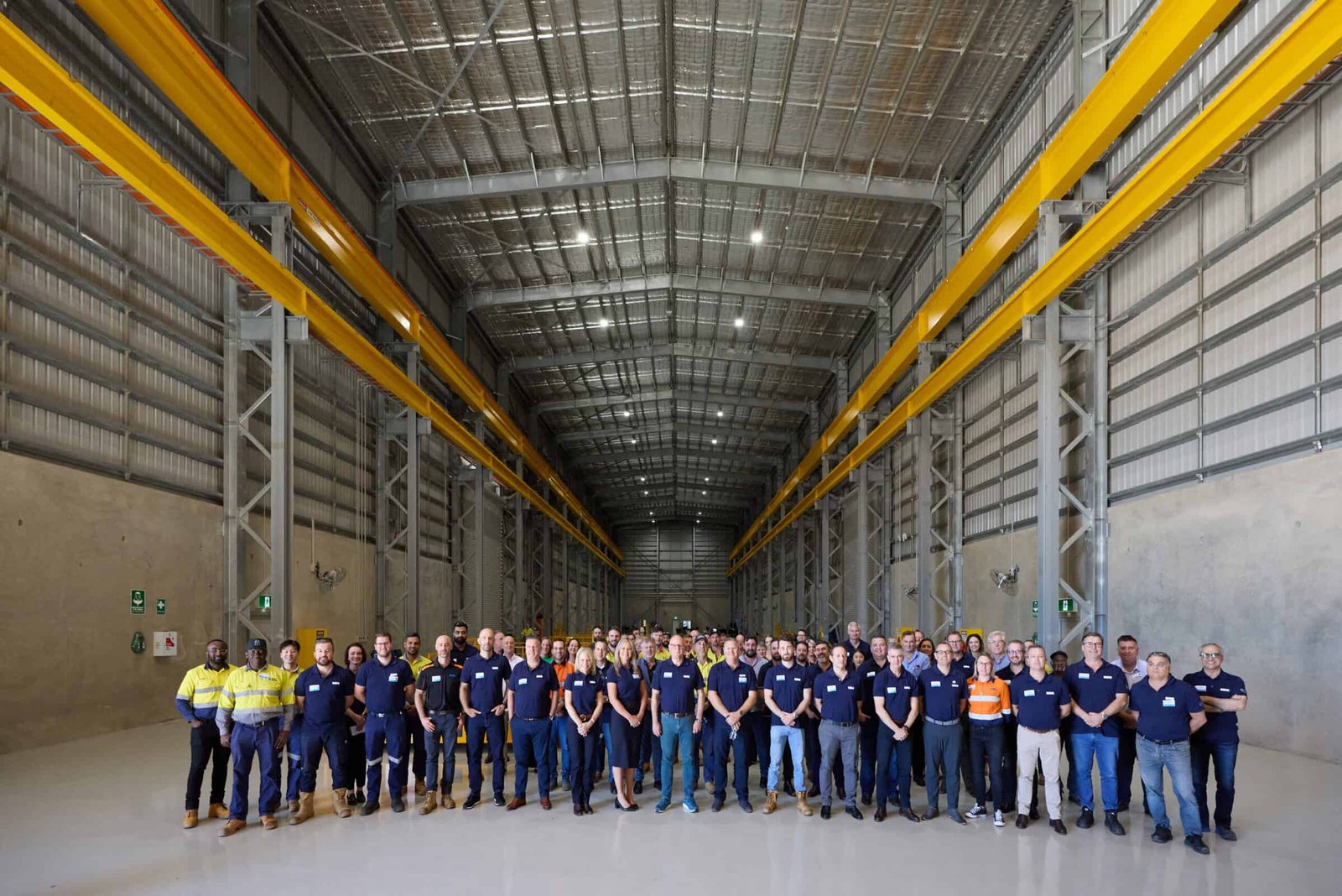 Weir employees standing inside the brand new, expansive Port Hedland service centre.