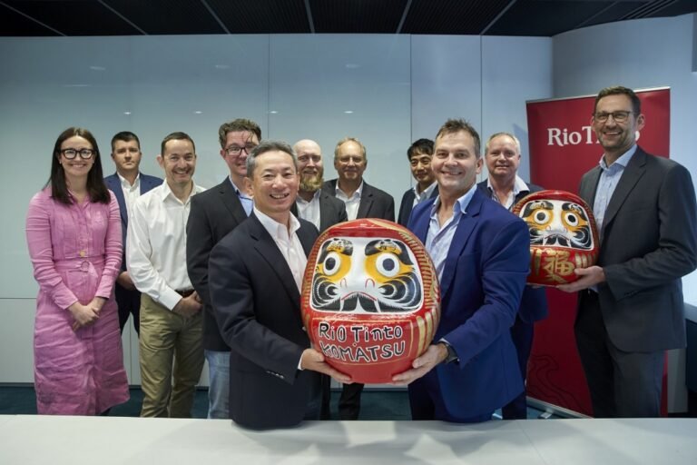 (Image source: Komatsu) Komatsu president mining business Max Moriyama and Rio Tinto global head of procurement Jamie Sanders with their teams at the Daruma doll ceremony, a special Japanese ritual, to celebrate the 300th delivery.