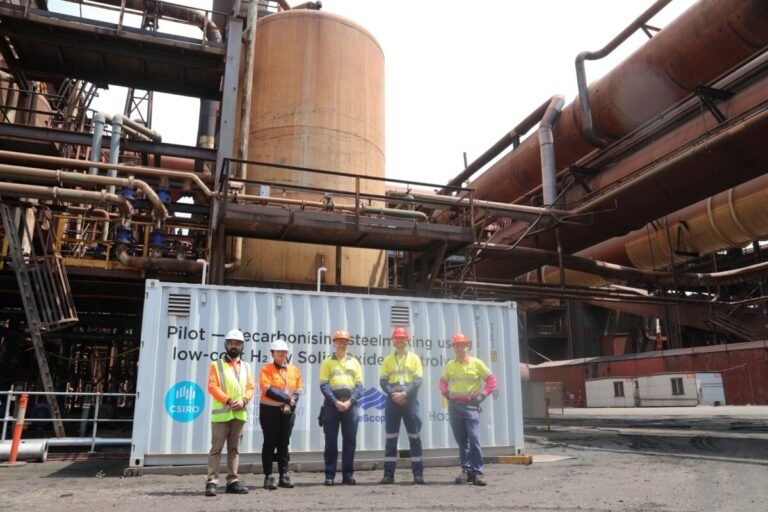CSIRO’s Sarb Giddey and Gurpreet Kaur, BlueScope’s Shannon Ballard and Michael Biro, as well as Hadean Energy’s Chris Rowland outside the shipping container housing the electrolyser at BlueScope in Port Kembla, NSW.