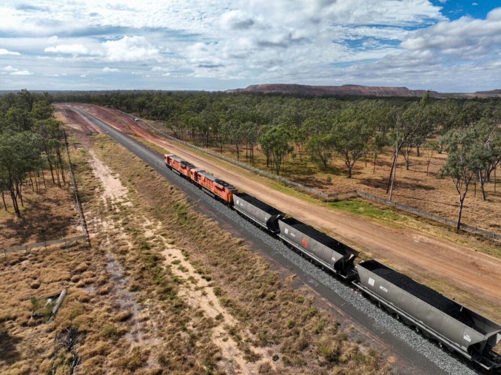 (Image source: Bravus Mining and Resources) A Bowen Rail Company trail hauling coal from the Carmichael mine along the Carmichael Rail Network.