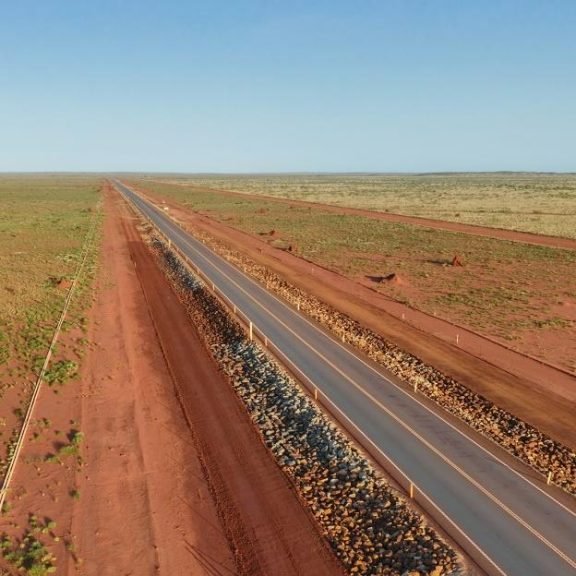 (Image source: MinRes) Despite the roadworks, the project shipped a record 3.2mt of ore in August 2025.